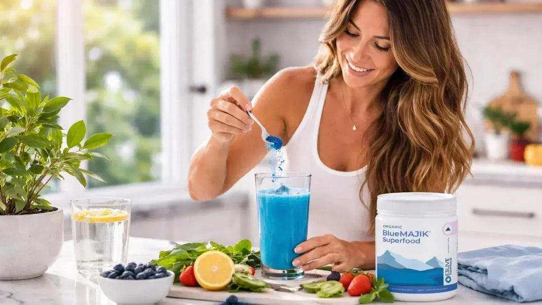 Woman preparing a blue spirulina smoothie as part of a daily wellness routine