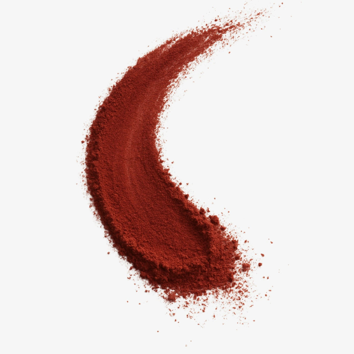 Astaxanthin loose powder on light grey surface