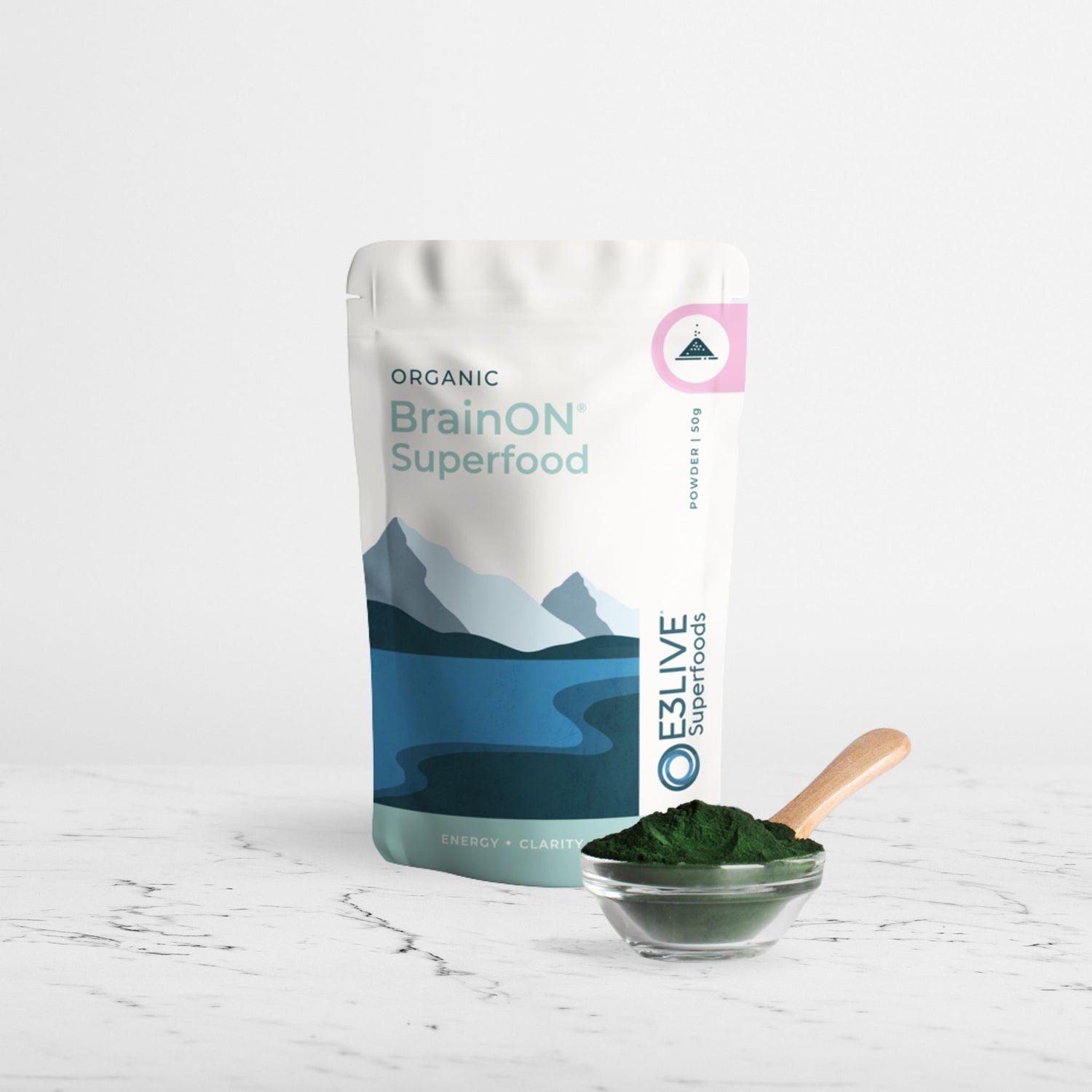 BrainON Superfood package with a bowl of green powder
