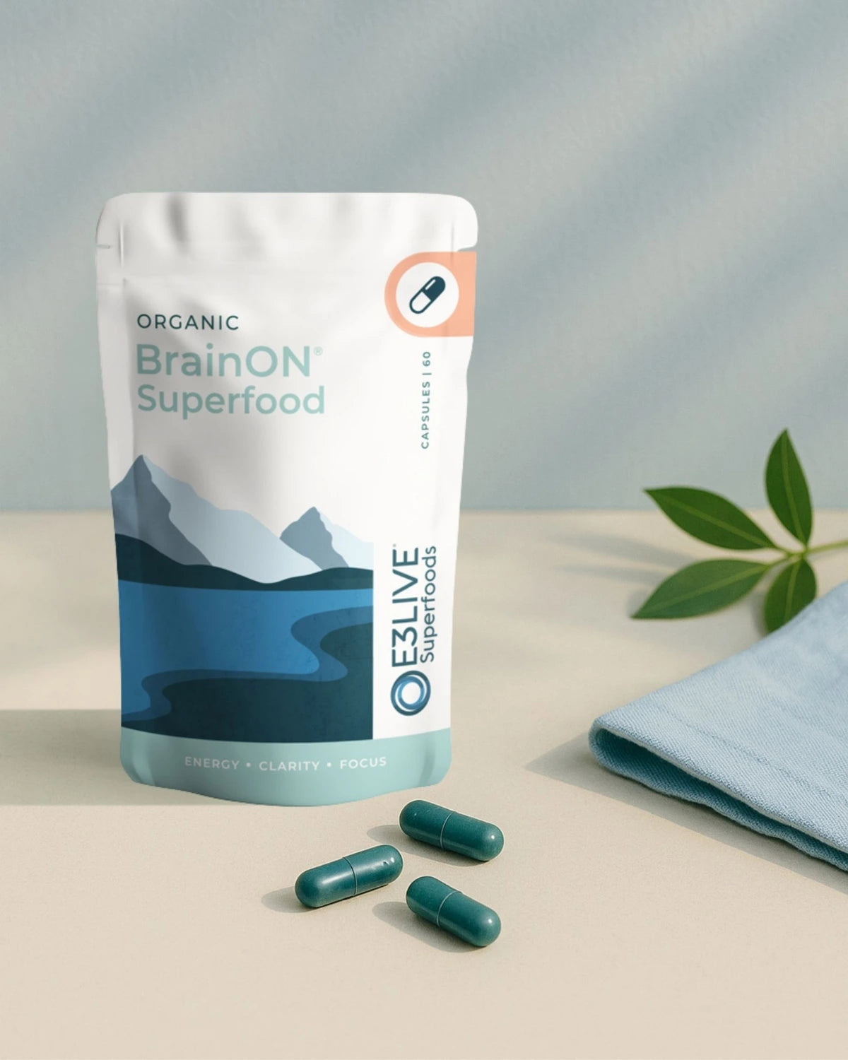 Bag of Organic BrainON Superfood with capsules on a neutral background