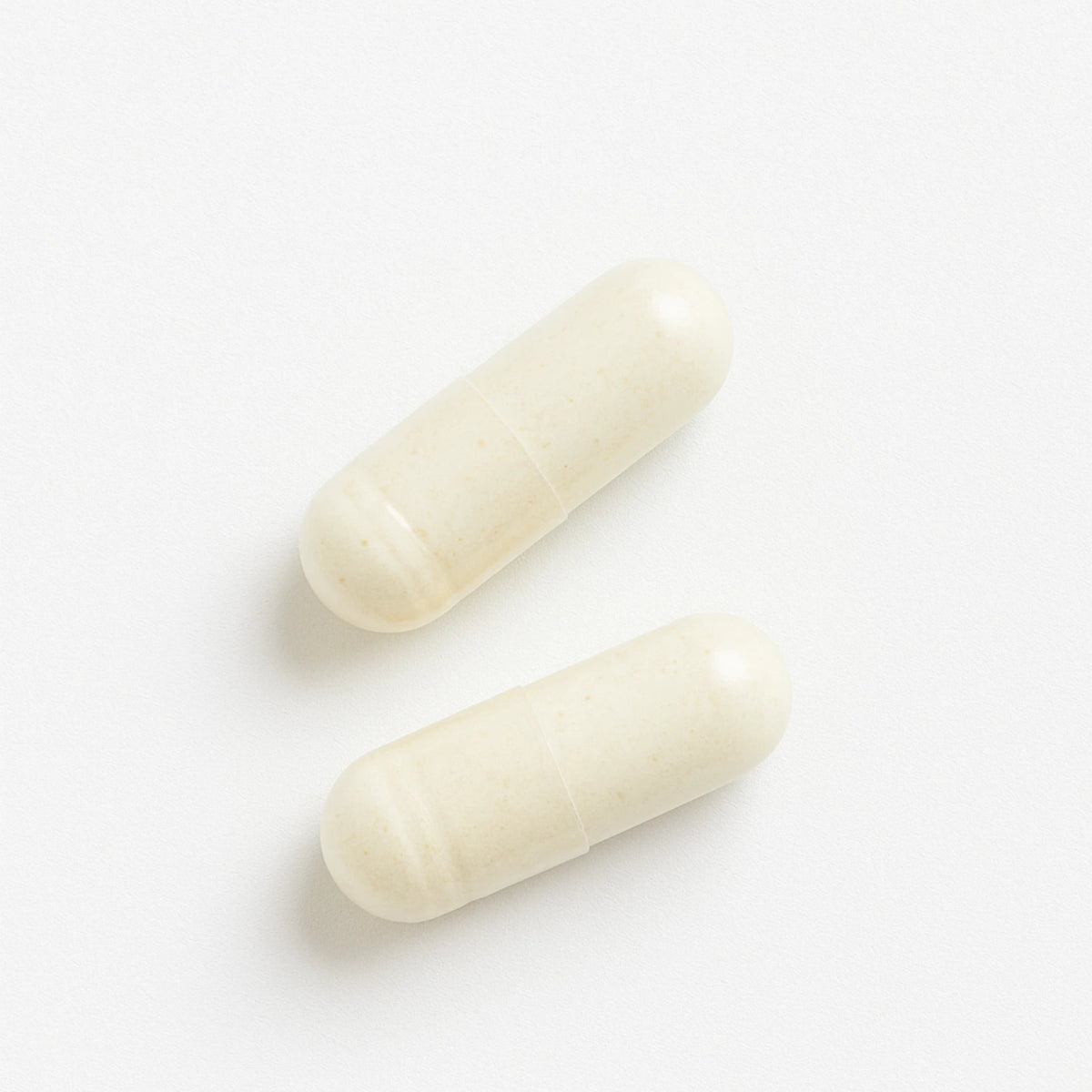 Two E3Enzymes Supreme capsulesd on a white background