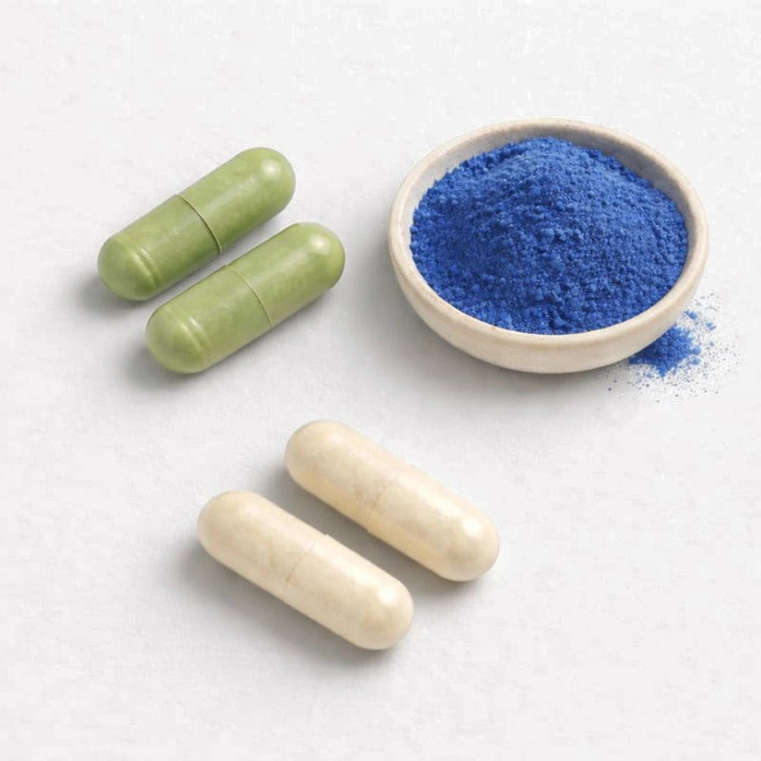 Inflammation & Joint Health: RenewME, E3Probiotics Gut Rescue, and E3Enzymes Supreme loose capsules + BlueMAJIK powder in a small bowl.