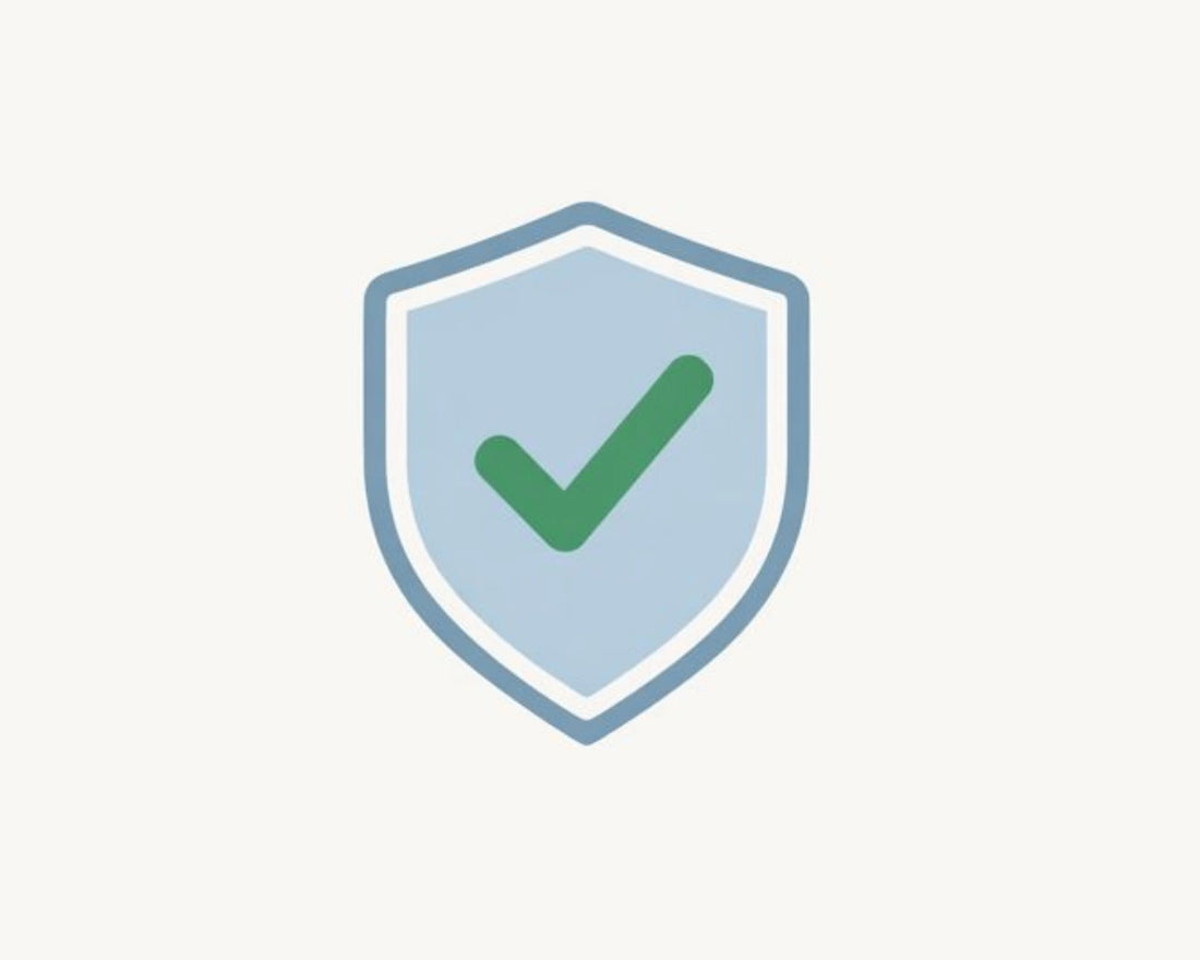 Shield icon with a green check mark on a light blue background