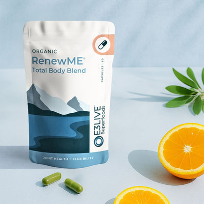 Packaging of Organic RenewME Total Body Blend with oranges on a light blue background