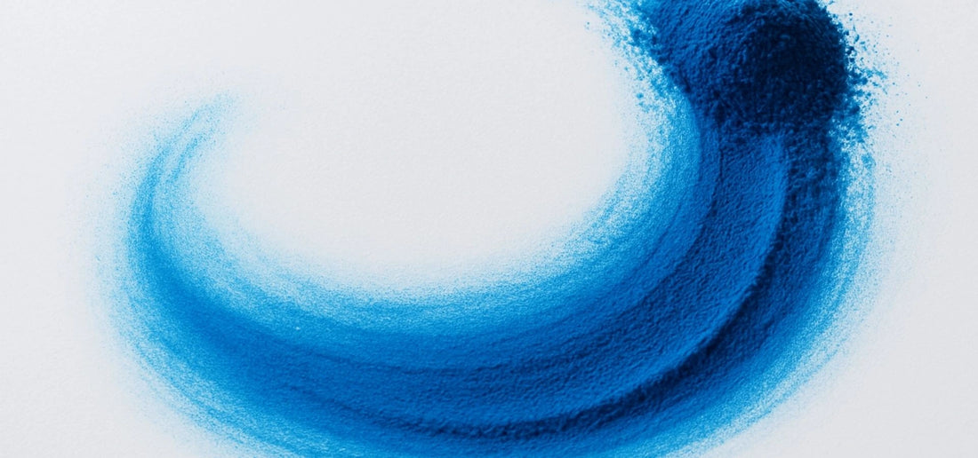 BlueMAJIK powder abstract circular design on a white background