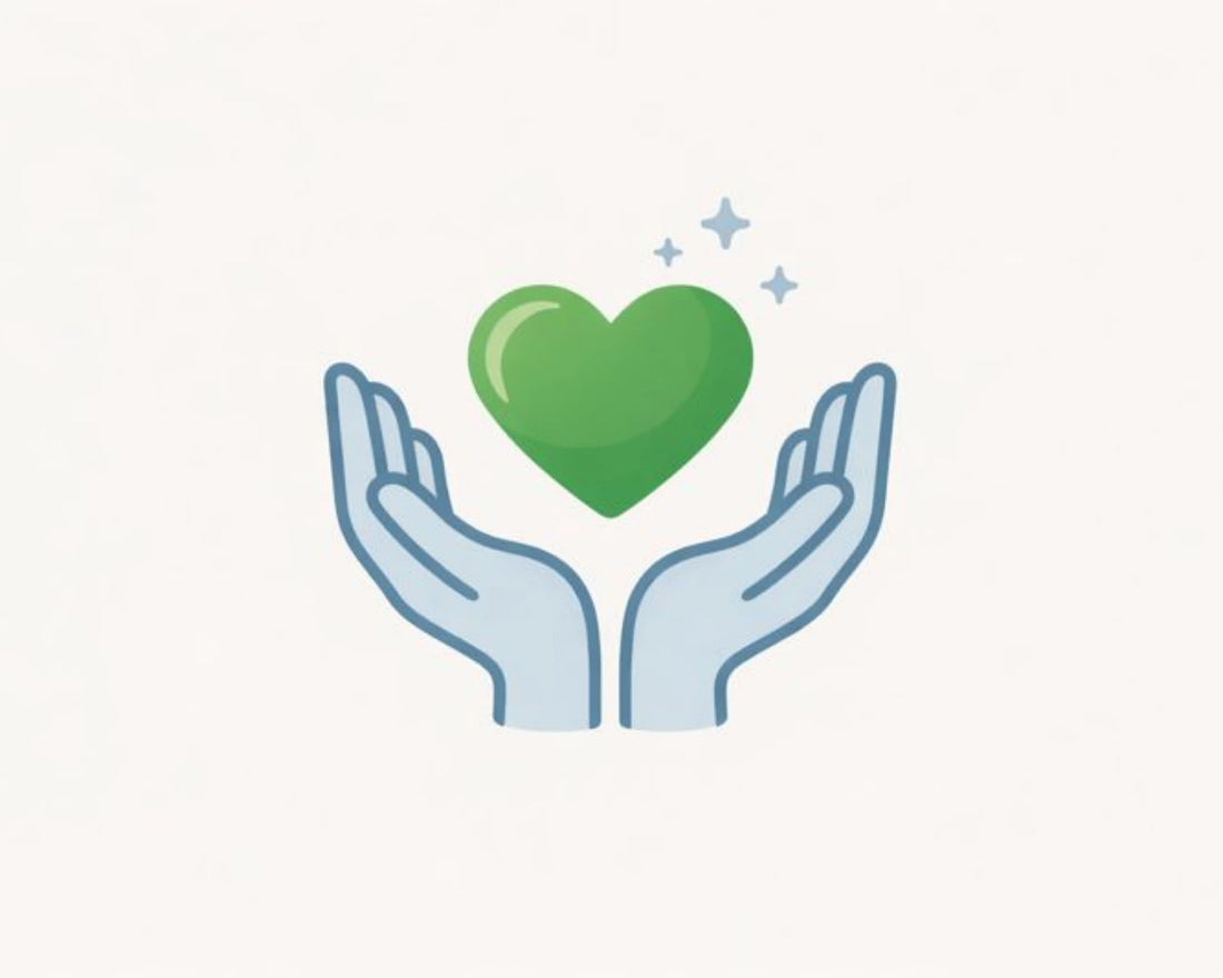 Two hands holding a green heart on a white background